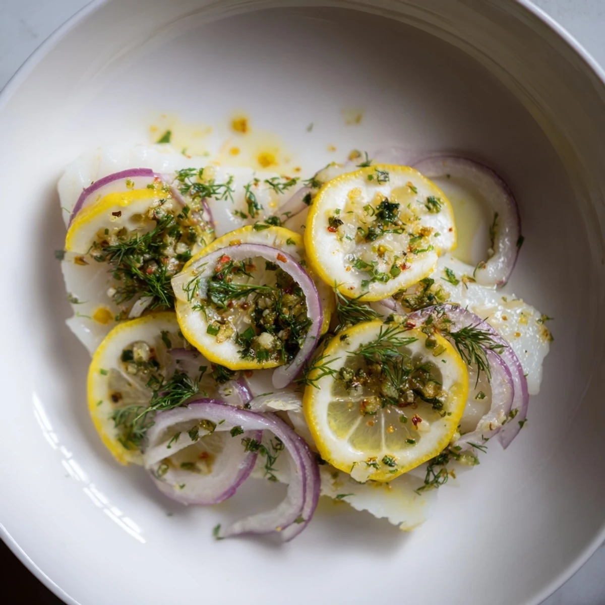 A close-up of golden brown baked fish, showcasing the tender, moist fillets.