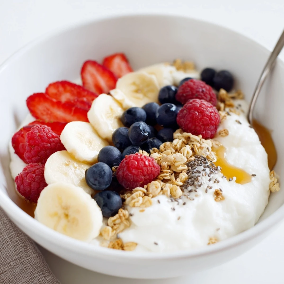 Cottage Cheese Breakfast Bowl served chilled, fragrant berries, crunchy granola, ready to spoon