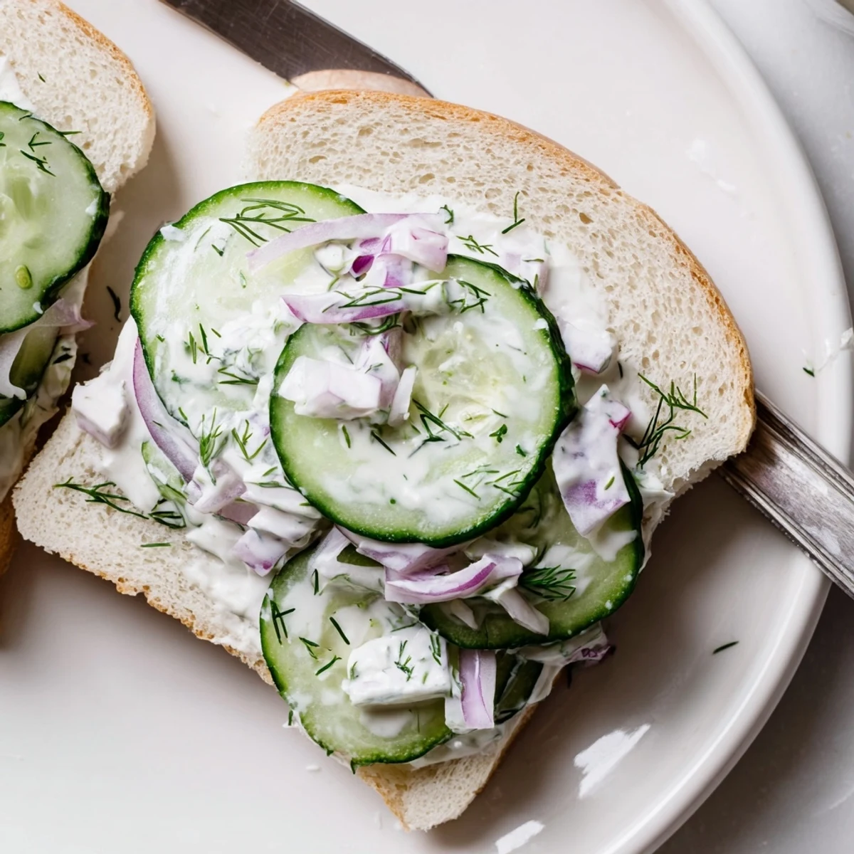 Quick Cucumber Salad Sandwiches with thinly sliced cucumber, creamy dressing, soft bread